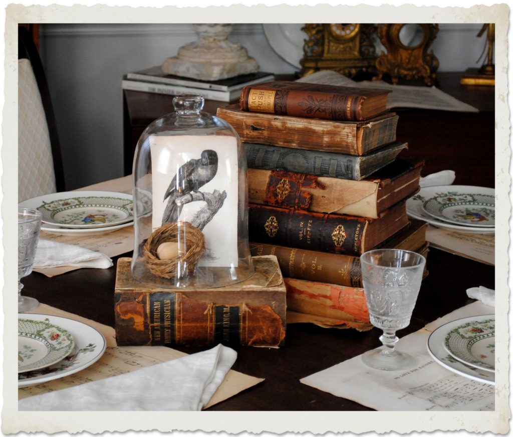 Cloche on books with old print