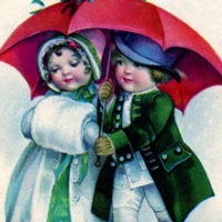 Boy and Girl under umbrella in snow