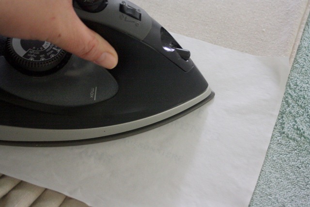 Ironing the wax paper