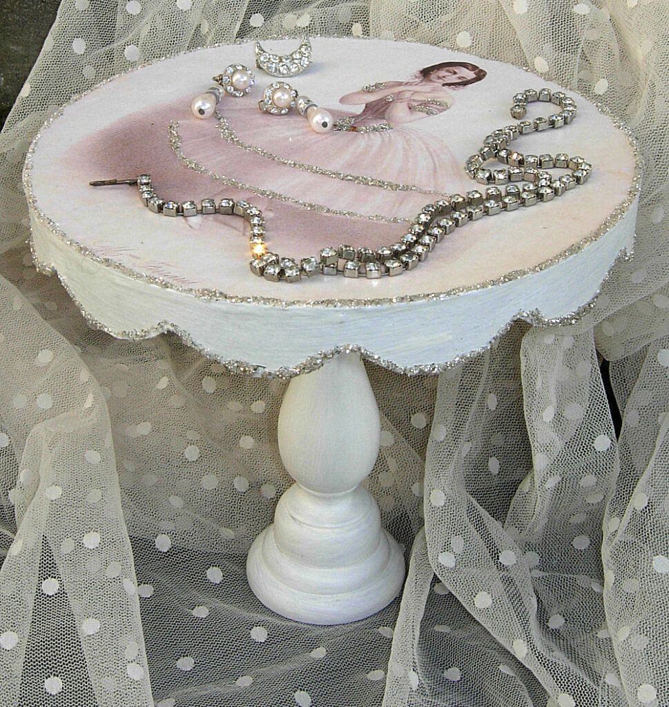 Finished DIY Pedestal Cake Stand with jewelry on it