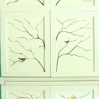 Decorative Painted Branches with Birds on Cabinet