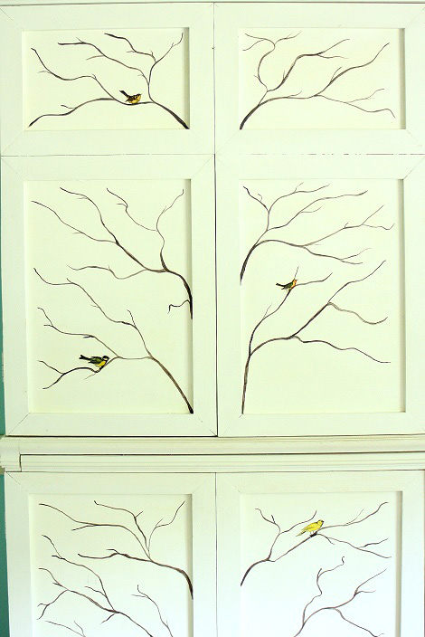 Decorative Painted Branches with Birds on Cabinet
