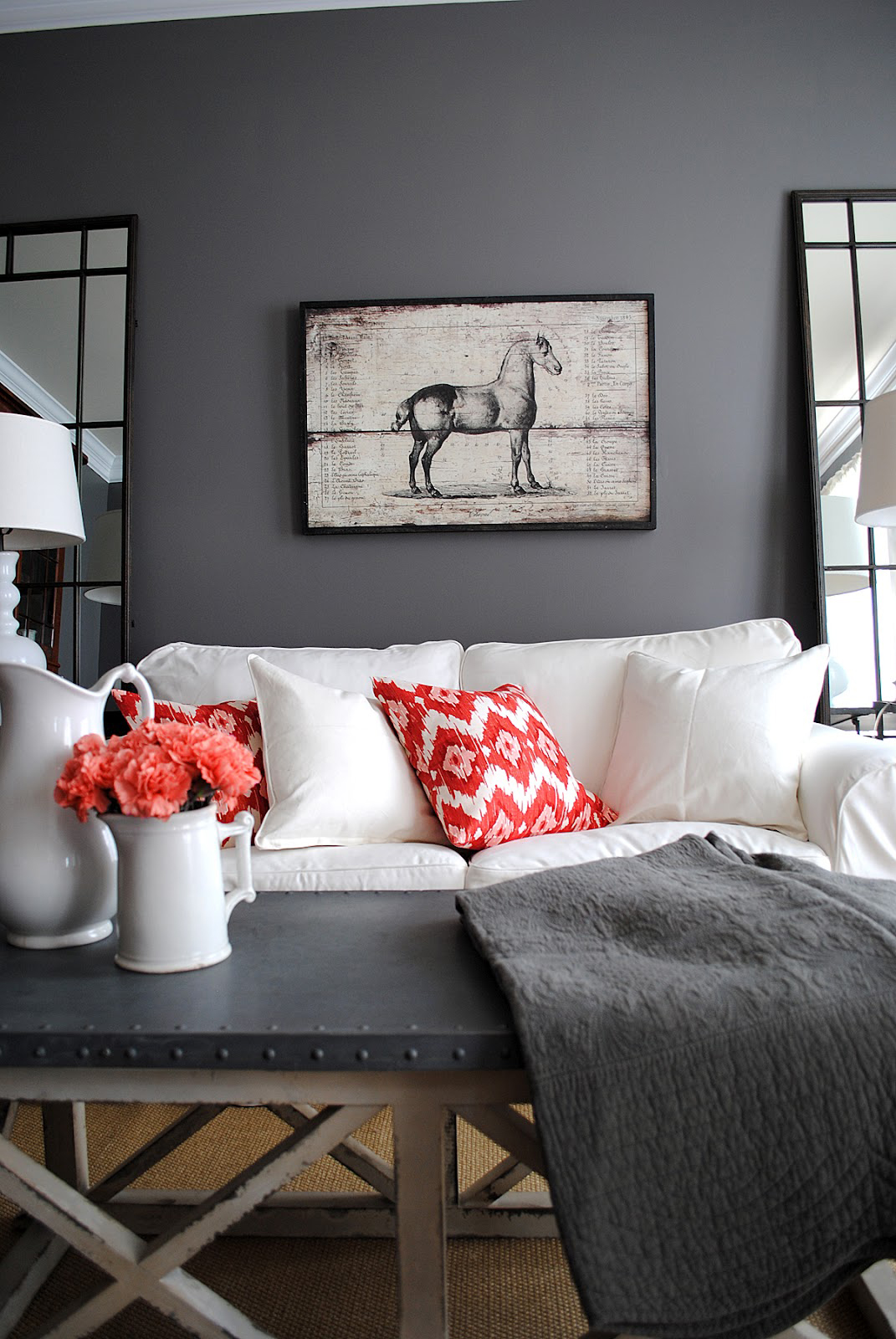 Sherwin Williams Gray Living Room with White sofa and horse print