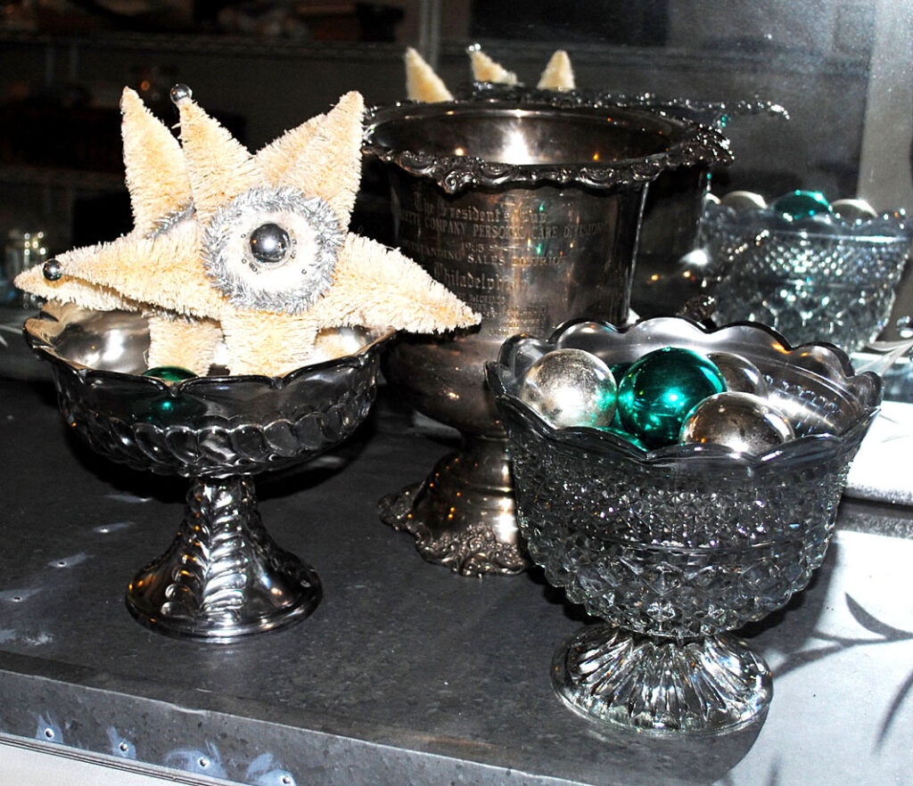 Silver painted glass bowls on display