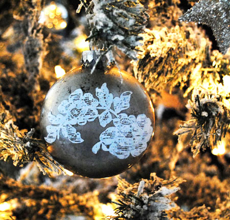 Painted Glass Ornament on Tree