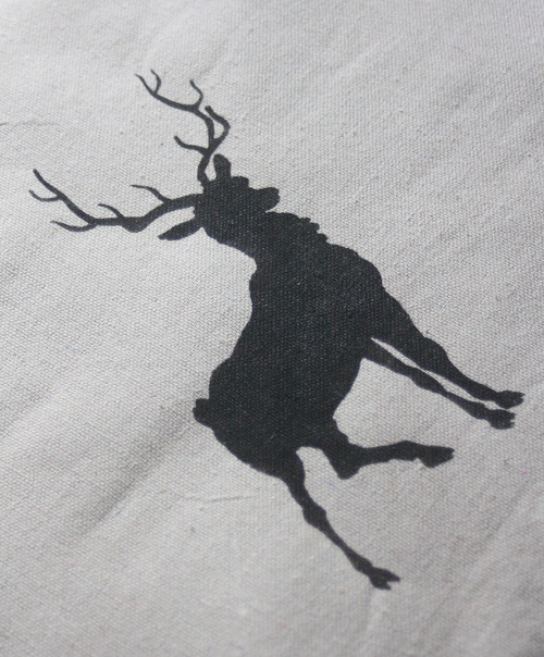 Reindeer painted on DIY tree skirt