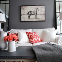 Living room with loveseat, pillows and horse print
