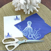 octopus stationary on table with scissors
