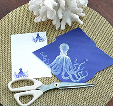 octopus stationary on table with scissors