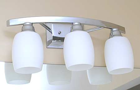 light fixture with white glass shades