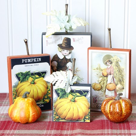 Pilgrims with pumpkins and gourds craft display