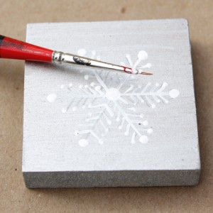 Painting snowflake on block
