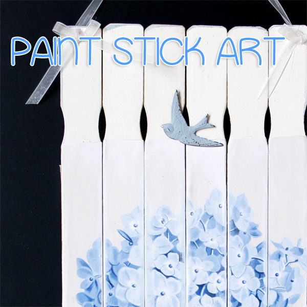 Paint stick art with bird and hydrangeas