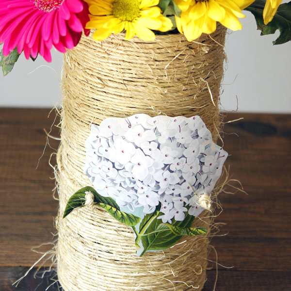 Twine wrapped vase with flowers