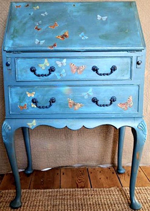 Blue painted butterfly dresser