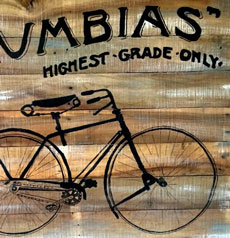 wooden sign with bike