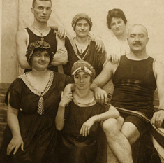 Old photo of men and women wearing bathing suits