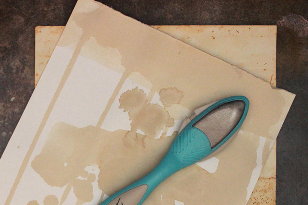 Adding more patina to old parchment paper