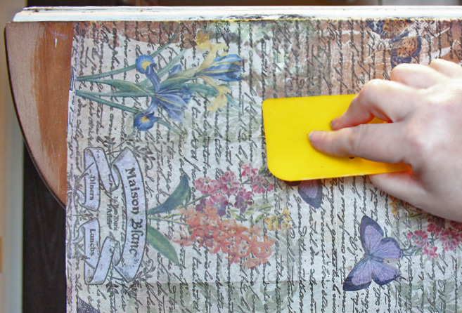 Smoothing decoupage paper