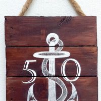 Anchor on wooden sign