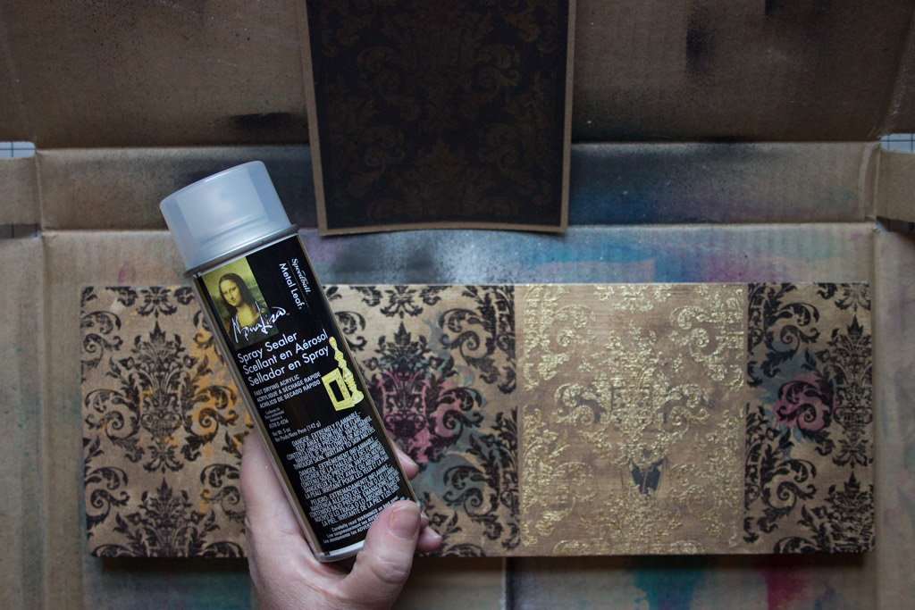finished metallic stamp effect products with spray