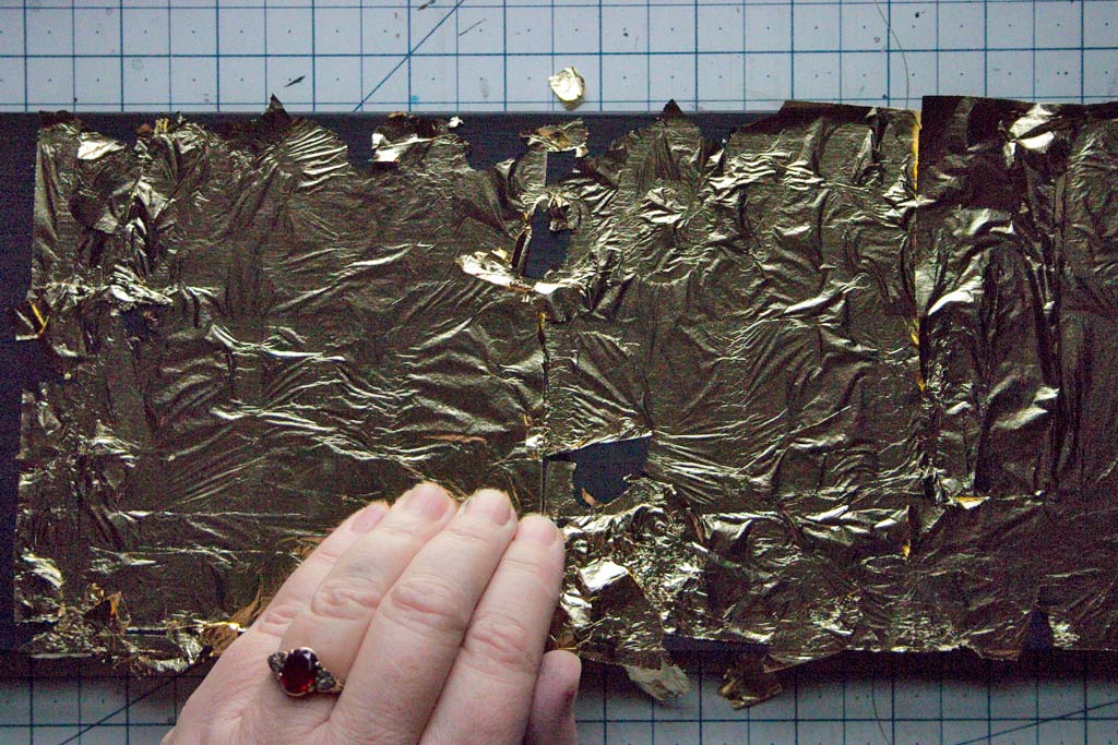 applying gold to the surface