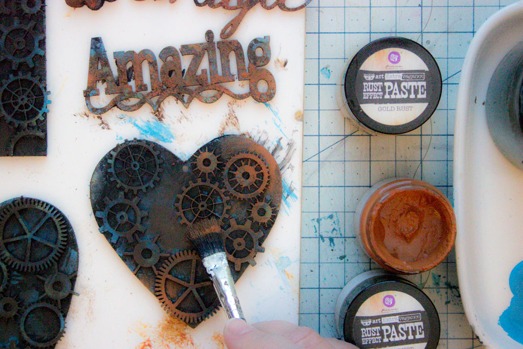 adding rust effect paste to heart with gears