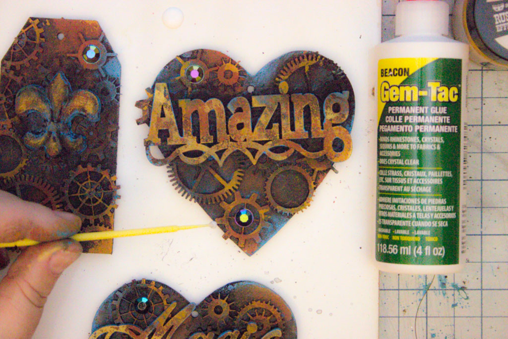 adding rhinestones to hearts with gears using gem tac glue