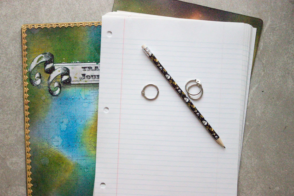 pencil with rings and paper