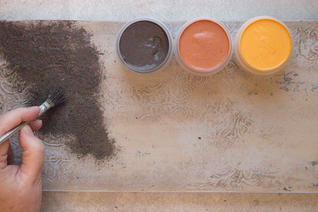 3 rust pastes with brown powder