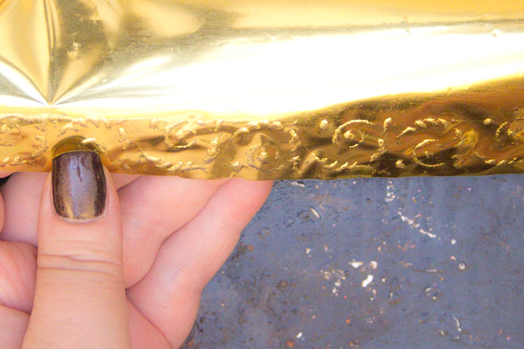 adding gold foil to metal painted trim