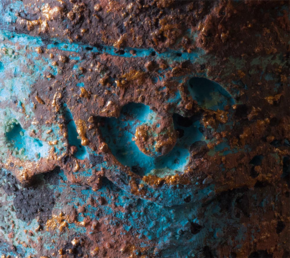 close up of patina finish on pot