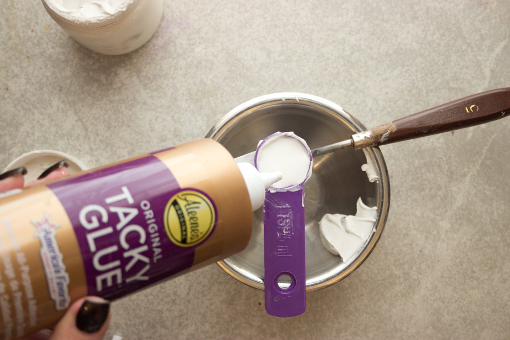 Pouring glue into teaspoon