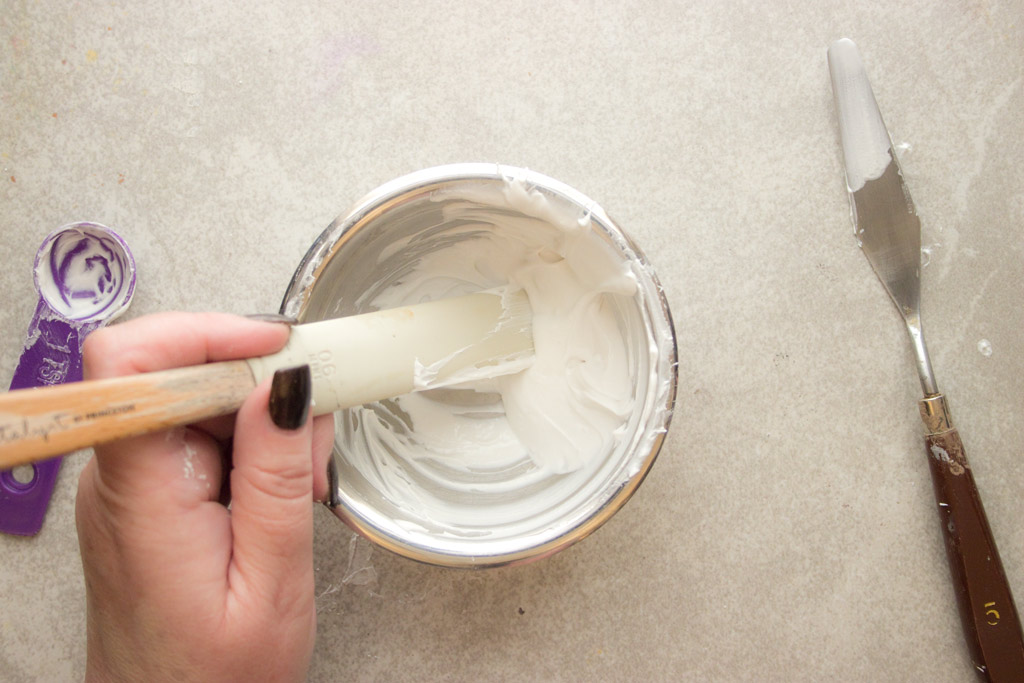 Mixing modeling paste in bowl