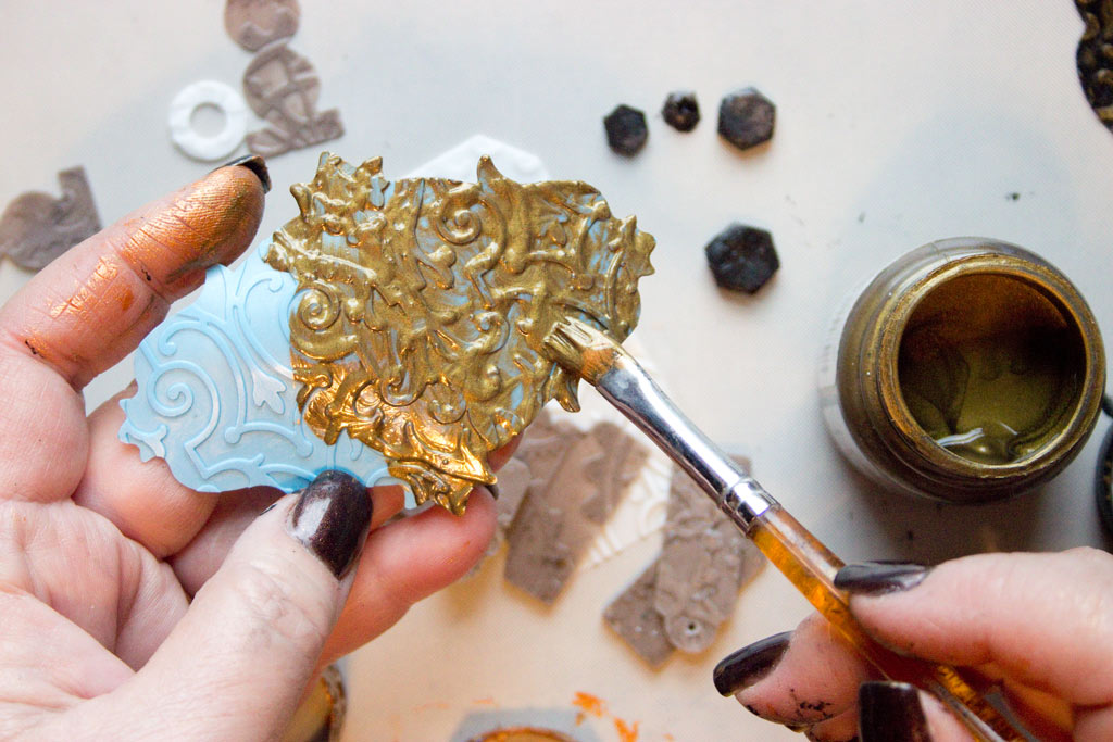 painting resin with gold paint