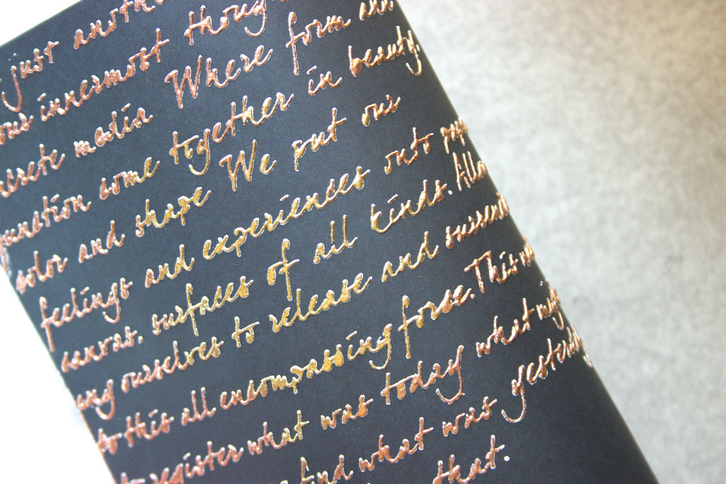 embossed gold text
