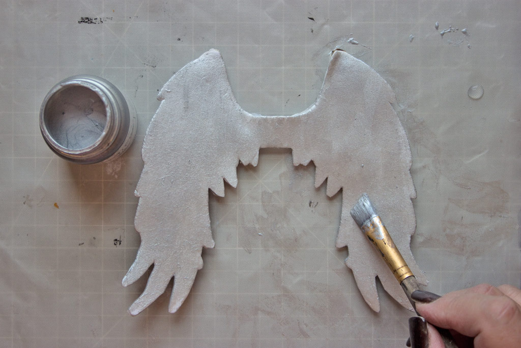Painting wings with silver paint