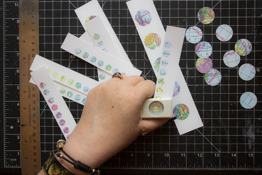 punching out circle designs with punch