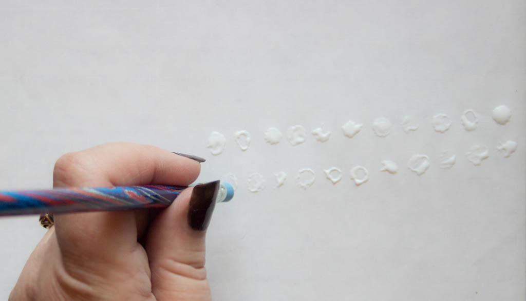 using pencil erasure to create dots of glue