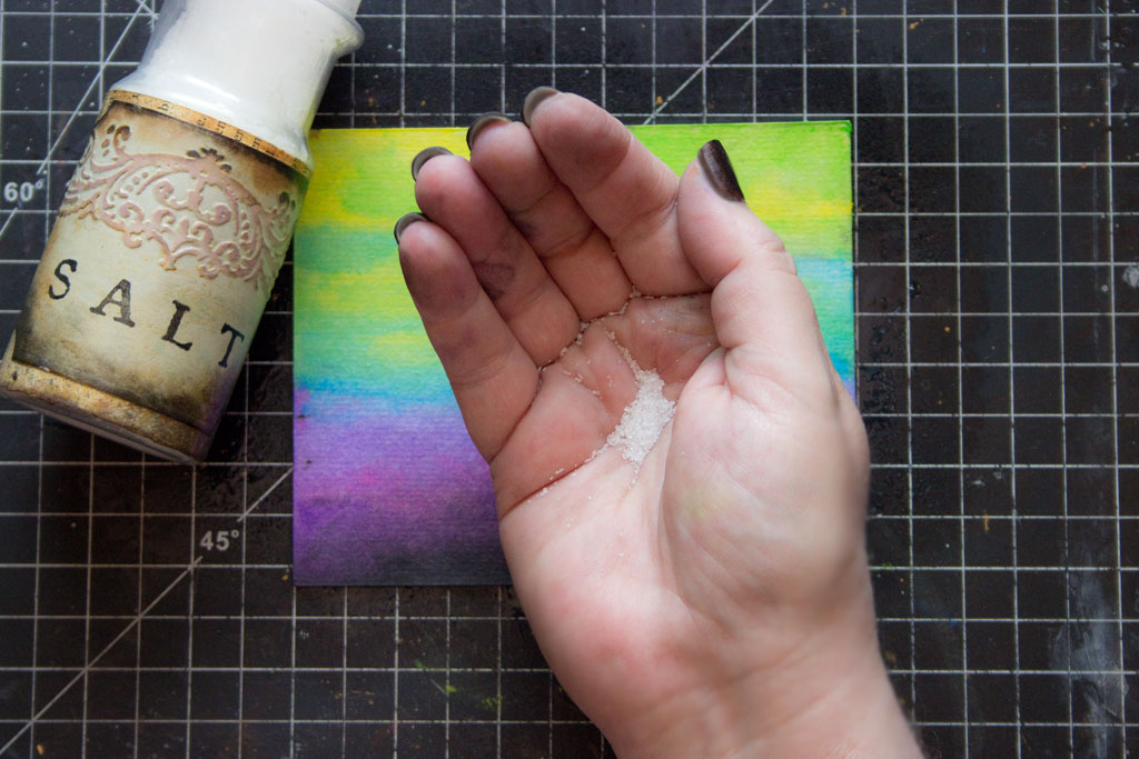 adding salt to colored paper