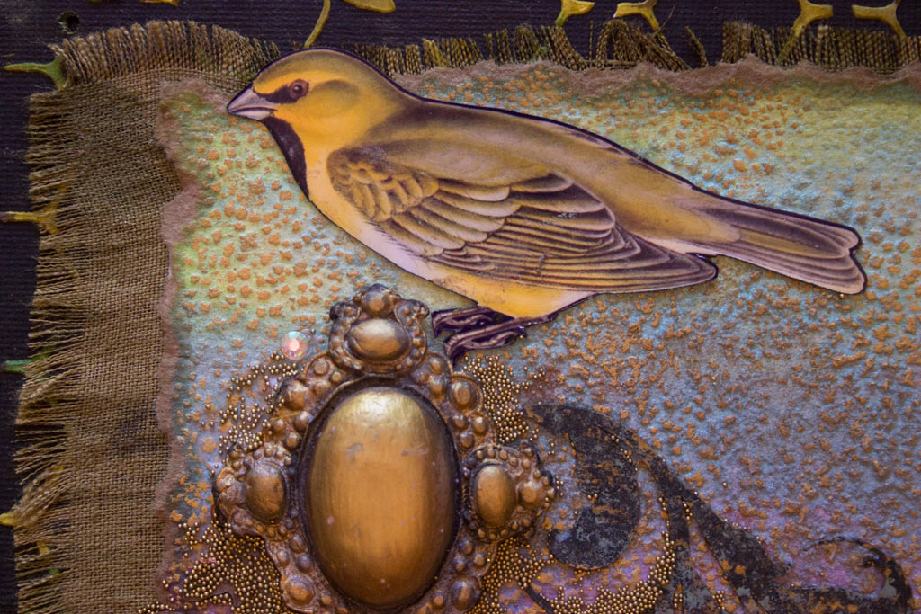close up of watercolor salt effect with bird and jewels