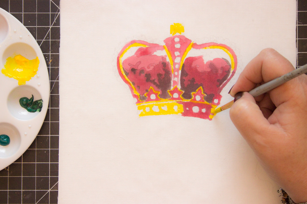 painting crown with brush