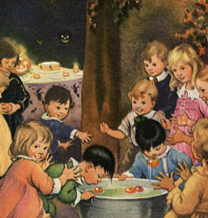 A group of young children bobbing for apples
