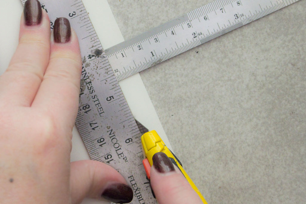 using ruler as a guide for cutting with knife