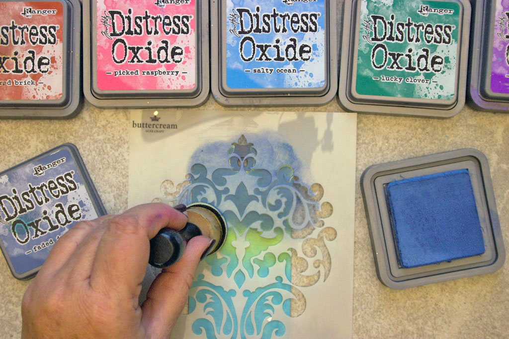 stenciling on tag with tim holtz distress oxide ink