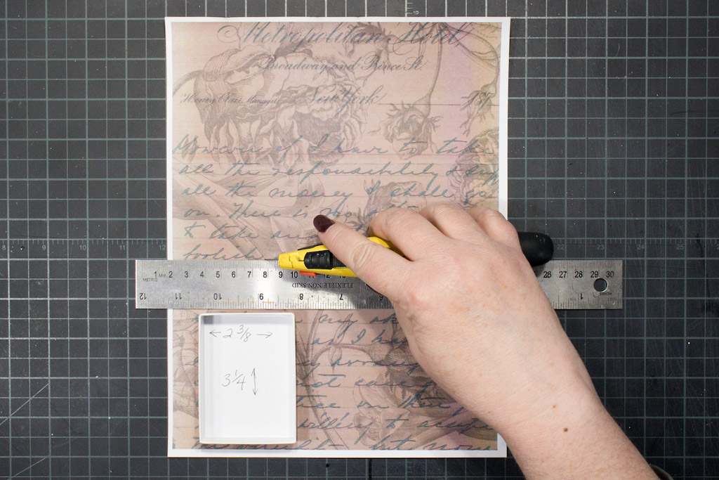 cutting paper with ruler
