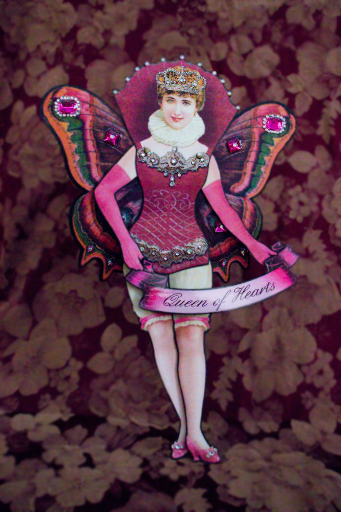 Paper art doll with wings with banner