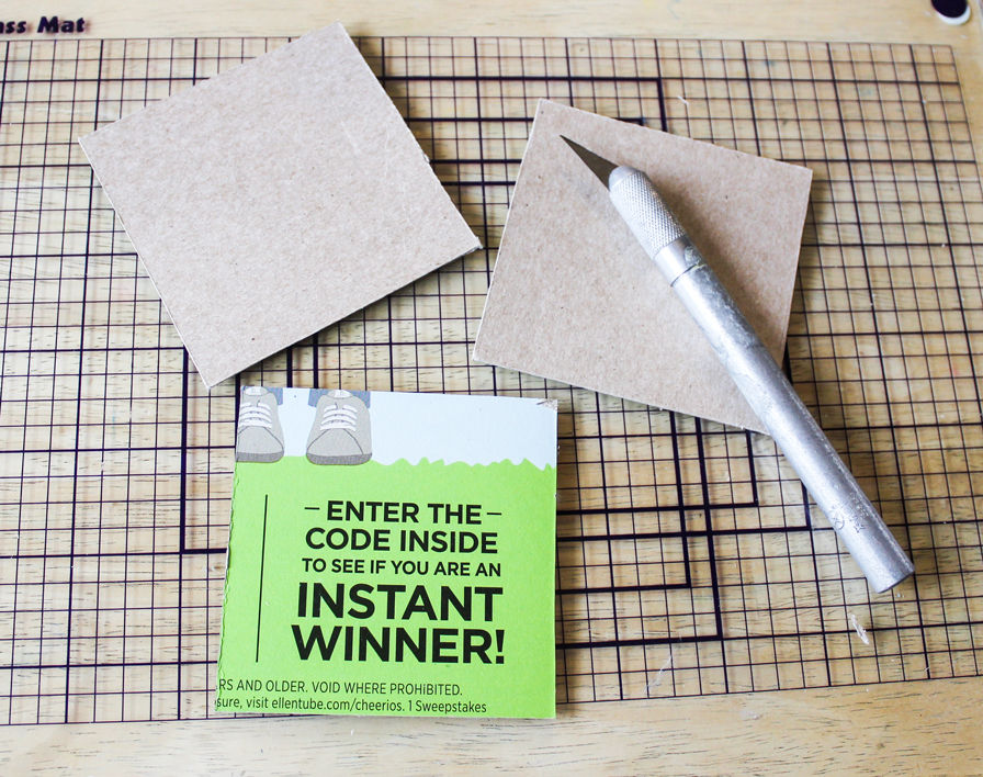 cardboard with knife and cutting mat