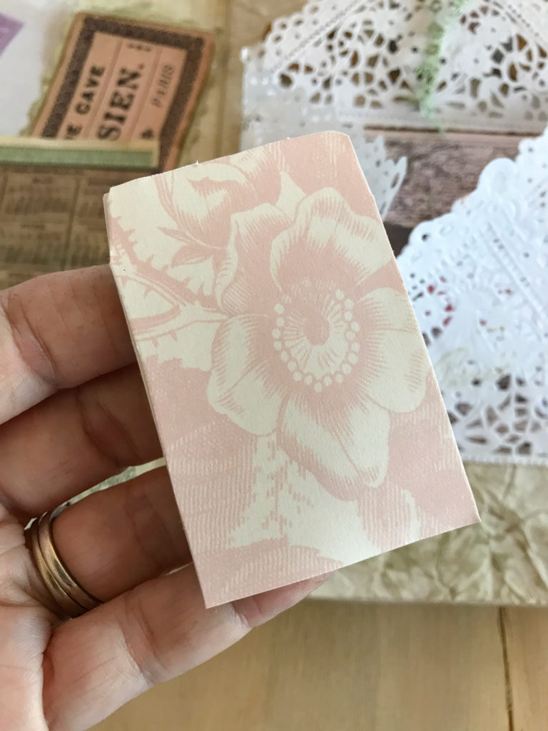 pink floral envelope with lace doilies