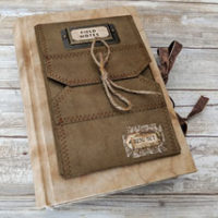Brown journal cover with envelope